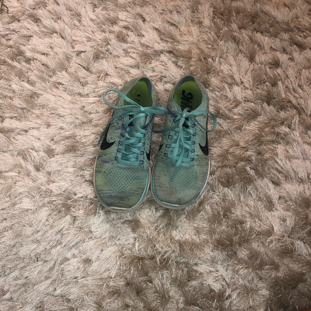 Blue Nike tennis shoes